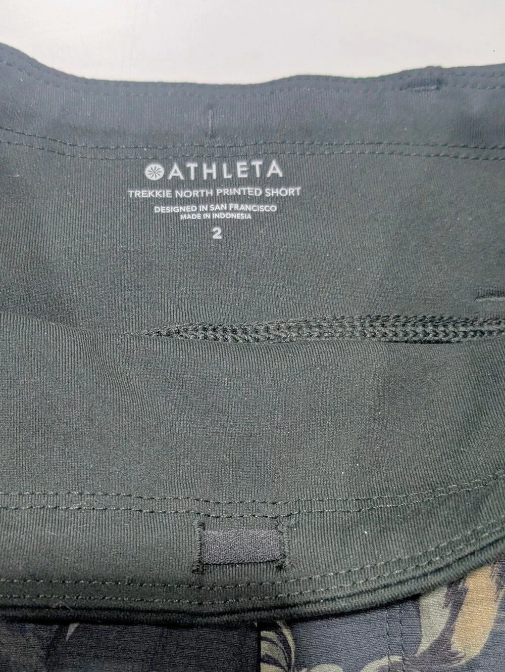 Athleta Dark Green Shorts with Beige Floral Print
